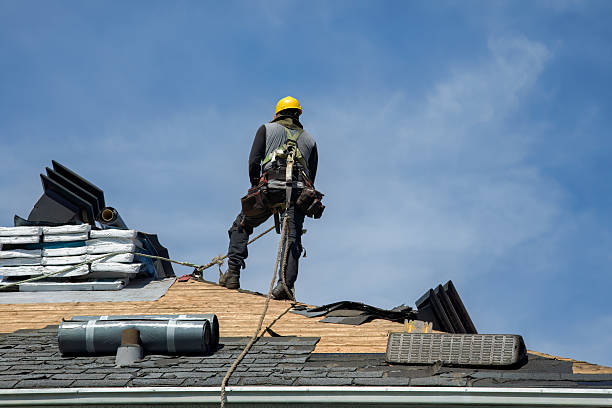 Professional Storm Damage Roof Repair technician working in Clearfield, UT
